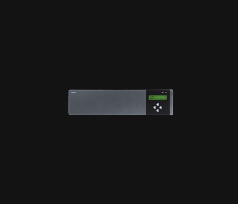 Rack-mounted sound masking generator with a backlit LCD and cursor buttons.