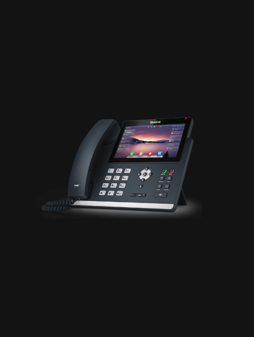 Black desktop VoIP phone with a large color touchscreen, corded handset, and dial pad.